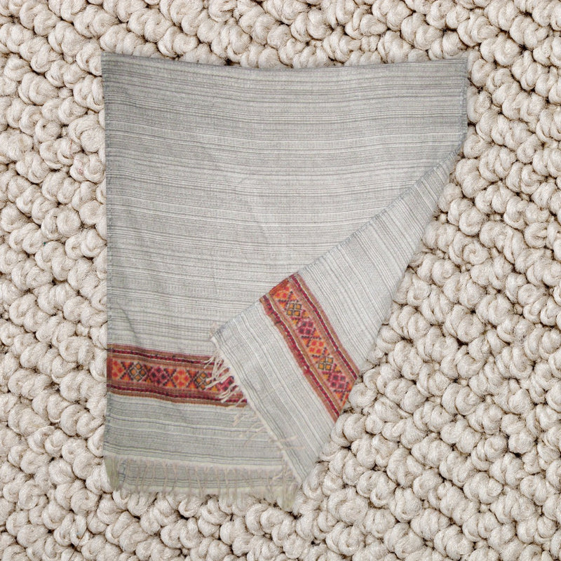 Beige shawl with red pattern