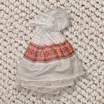 Beige shawl with red pattern