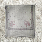 Grey shawl with dark grey pattern